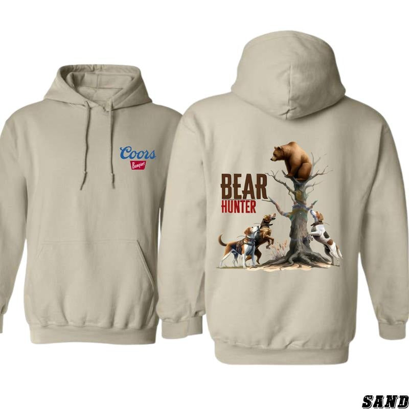 Coors Banquet Hoodie - Bold Bear Hunter Design Featuring Dogs in Action, camo country hoodies, country boy clothing, Perfect for Hunting Enthusiasts and Beer Lovers, Unisex Hoodie for Ultimate Comfort and Outdoor Adventure Spirit Menswear Sweaters
