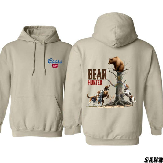 Coors Banquet Hoodie - Bold Bear Hunter Design Featuring Dogs in Action, camo country hoodies, country boy clothing, Perfect for Hunting Enthusiasts and Beer Lovers, Unisex Hoodie for Ultimate Comfort and Outdoor Adventure Spirit Menswear Sweaters